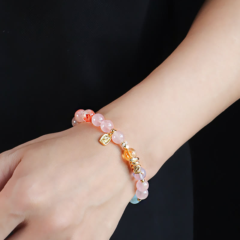 Pulsera de la suerte del año de la serpiente con Buddha Stones, varios cristales, cristal rosa y amatista