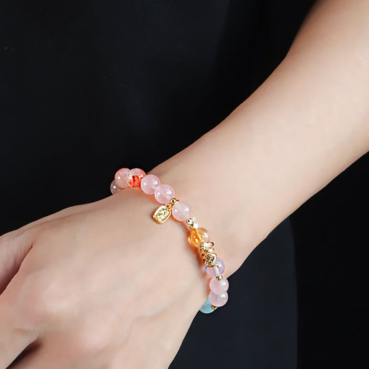 Pulsera de la suerte del año de la serpiente con Buddha Stones, varios cristales, cristal rosa y amatista