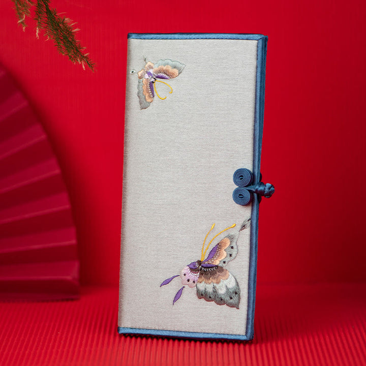 Bolso de mano con bordado de orquídea y mariposa con Buddha Stones