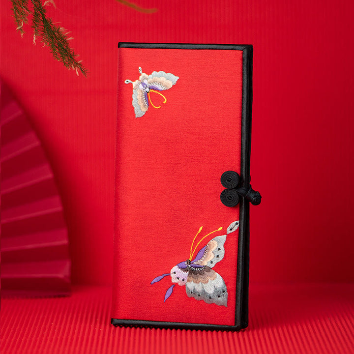 Bolso de mano con bordado de orquídea y mariposa con Buddha Stones