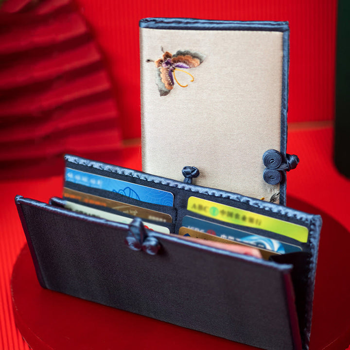 Bolso de mano con bordado de orquídea y mariposa con Buddha Stones