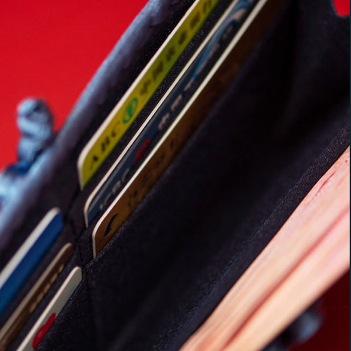 Bolso de mano con bordado de orquídea y mariposa con Buddha Stones