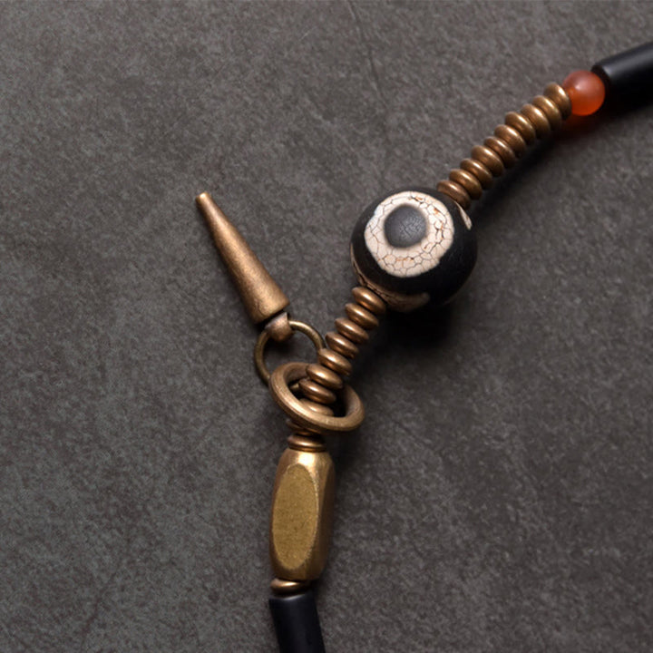 Pulsera protectora de doble vuelta con colgante de cono de cuentas Dzi de cobre y ónix negro y Buddha Stones