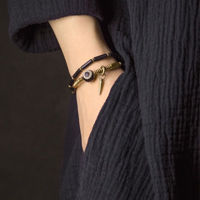 Pulsera protectora de doble vuelta con colgante de cono de cuentas Dzi de cobre y ónix negro y Buddha Stones