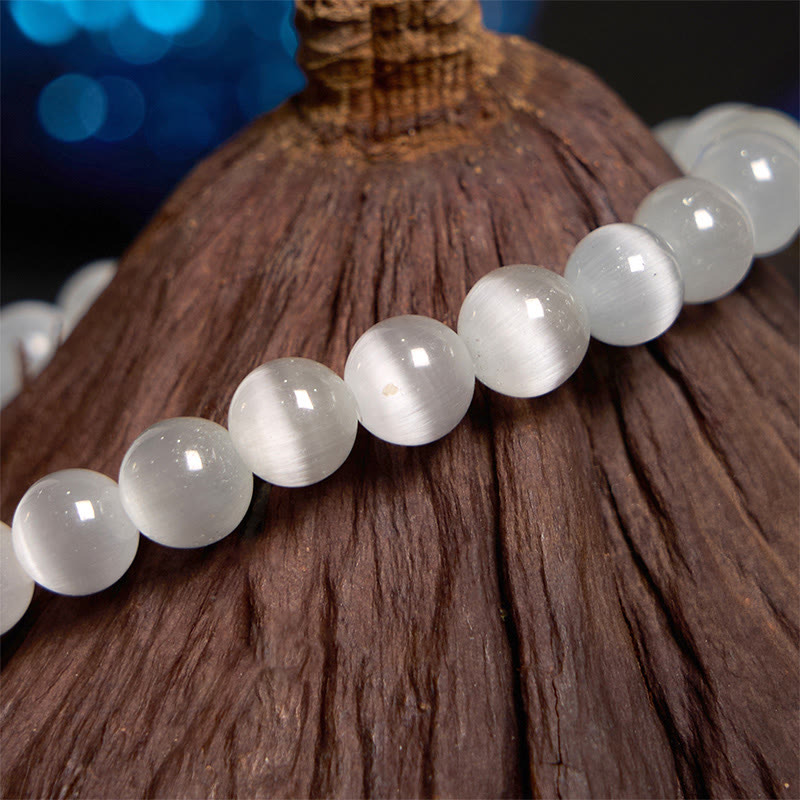 Pulsera de amor con flor de crisoberilo y ojo de gato con Buddha Stones