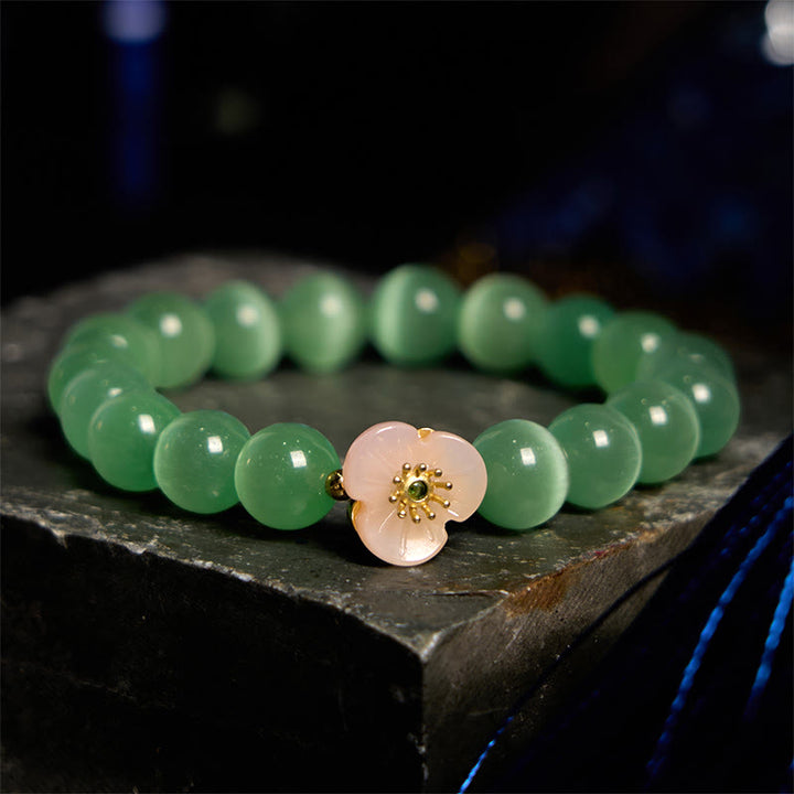 Pulsera de amor con flor de crisoberilo y ojo de gato con Buddha Stones