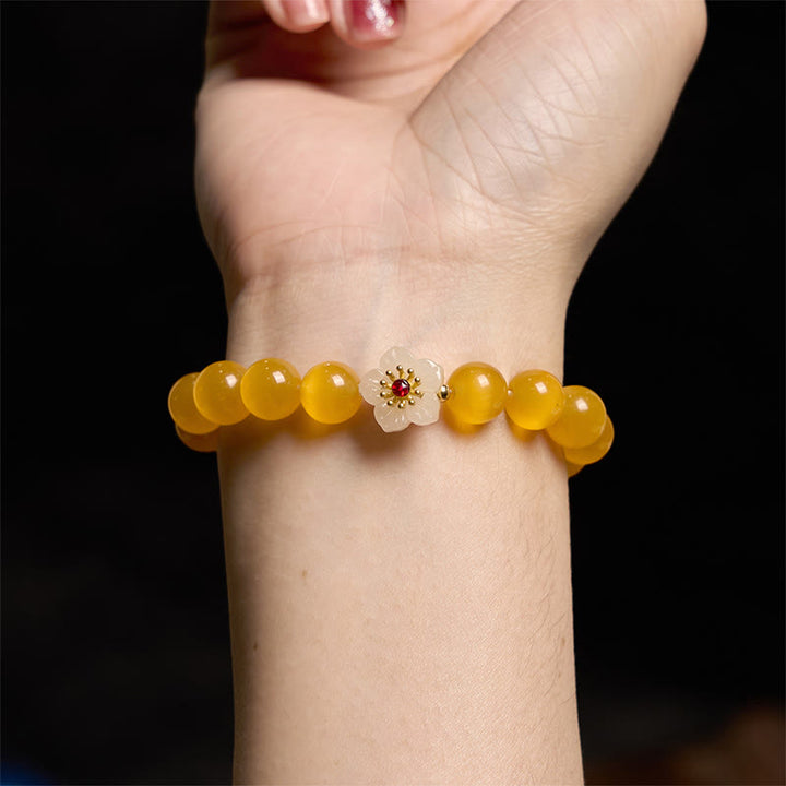 Pulsera de amor con flor de crisoberilo y ojo de gato con Buddha Stones
