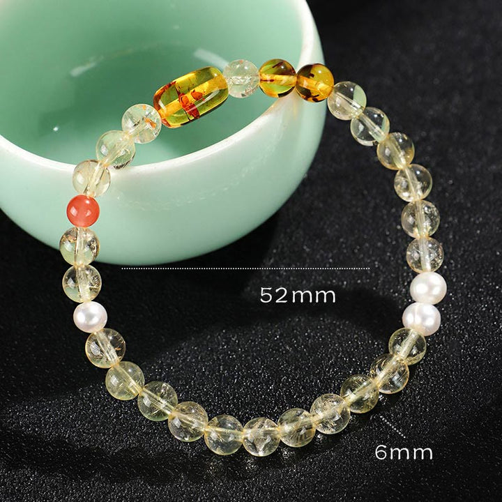 Pulsera de protección de cristal blanco con topacio, citrino y perla natural de Buddha Stones