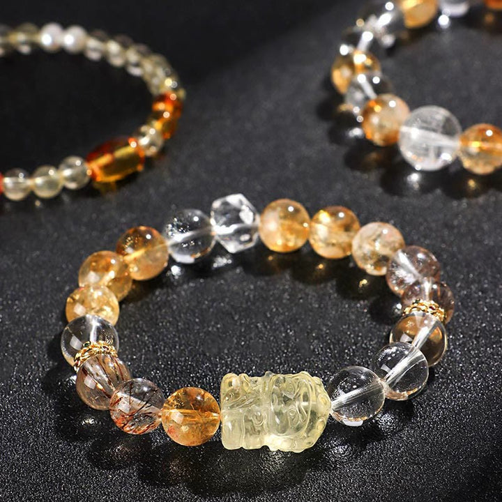 Pulsera de protección de cristal blanco con topacio, citrino y perla natural de Buddha Stones