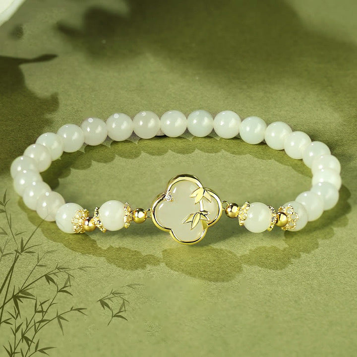 Pulsera de la suerte de bambú con trébol de cuatro hojas y jade hetiano de Buddha Stones en plata de ley 925