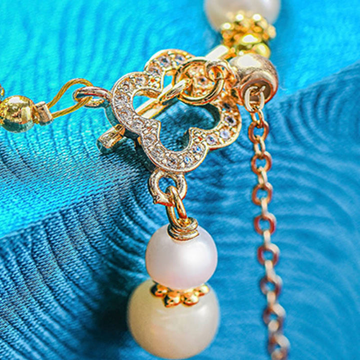 Pulsera de la abundancia con colgante de trébol de cuatro hojas de aleación de perla de jade hetiano y Buddha Stones