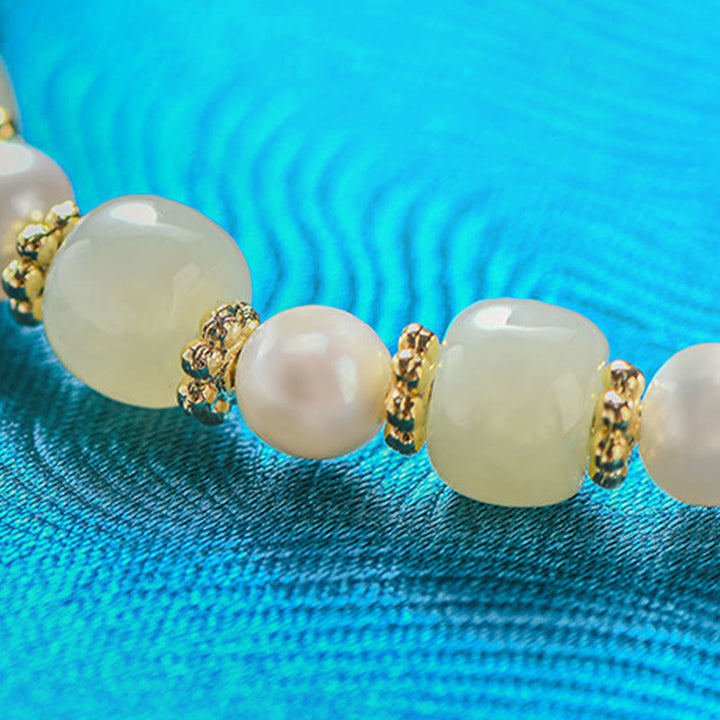 Pulsera de la abundancia con colgante de trébol de cuatro hojas de aleación de perla de jade hetiano y Buddha Stones