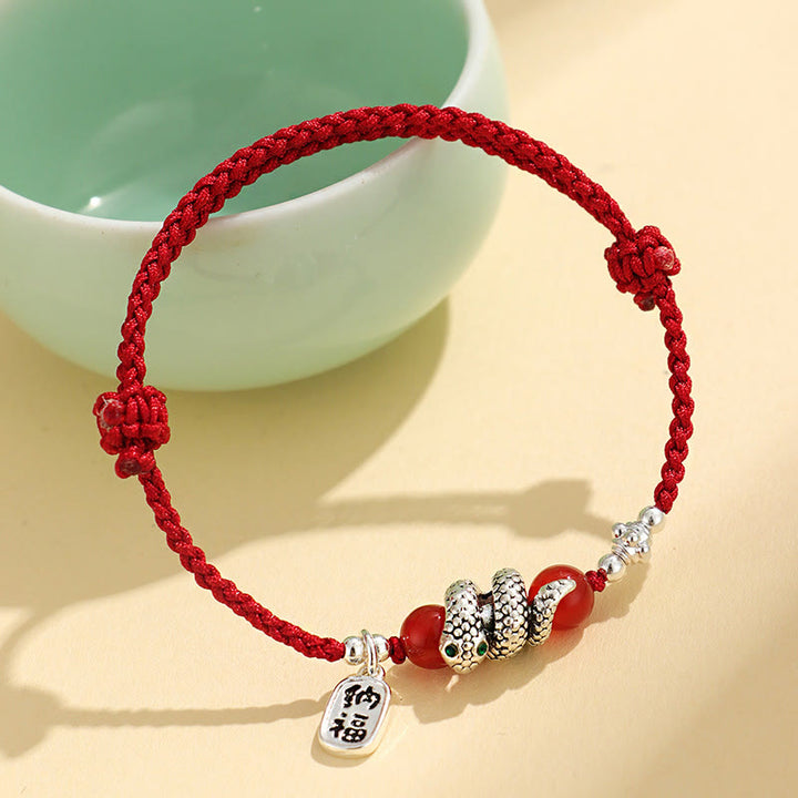 Pulsera de la suerte con hilo rojo y símbolo de Fu de cobre y Buddha Stones para el año de la serpiente