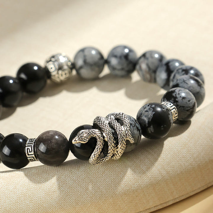 Pulsera de protección del año de la serpiente con obsidiana blanca, turquesa, jaspe gris y Buddha Stones con brillo plateado natural y obsidiana copo de nieve