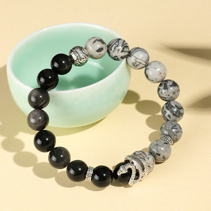 Pulsera de protección del año de la serpiente con obsidiana blanca, turquesa, jaspe gris y Buddha Stones con brillo plateado natural y obsidiana copo de nieve