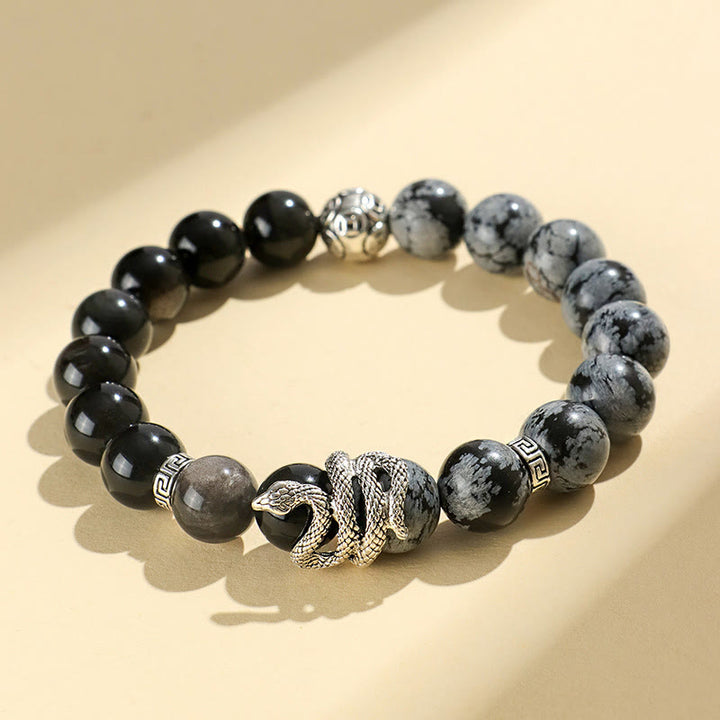 Pulsera de protección del año de la serpiente con obsidiana blanca, turquesa, jaspe gris y Buddha Stones con brillo plateado natural y obsidiana copo de nieve
