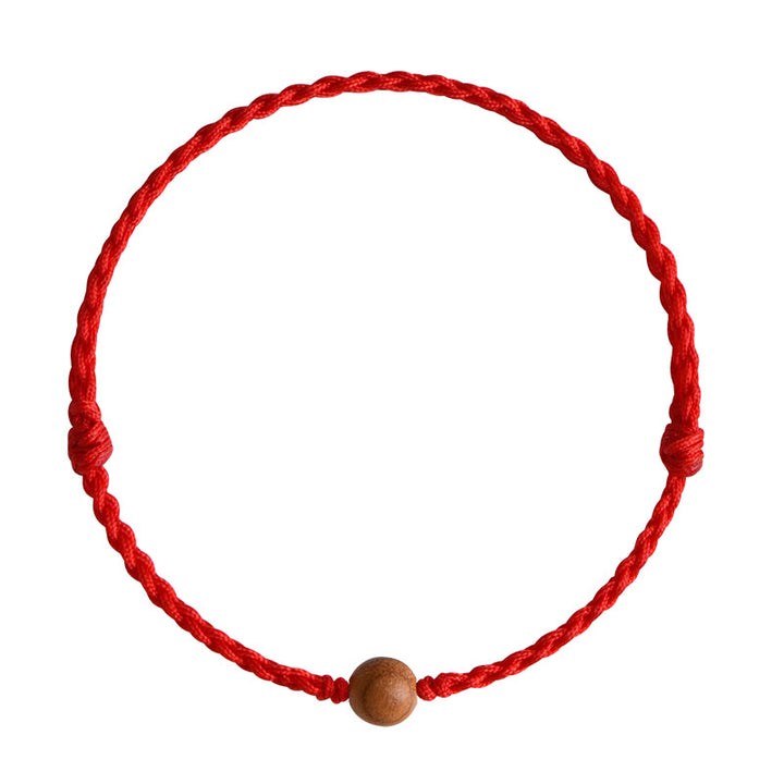 Pulsera trenzada con cuentas de madera de melocotón natural y Buddha Stones que alejan a los malos espíritus