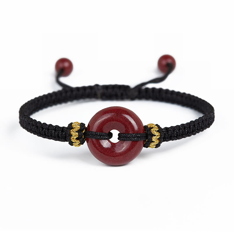 Pulsera trenzada de concentración con hebilla de paz redonda de cinabrio hecha a mano con Buddha Stones