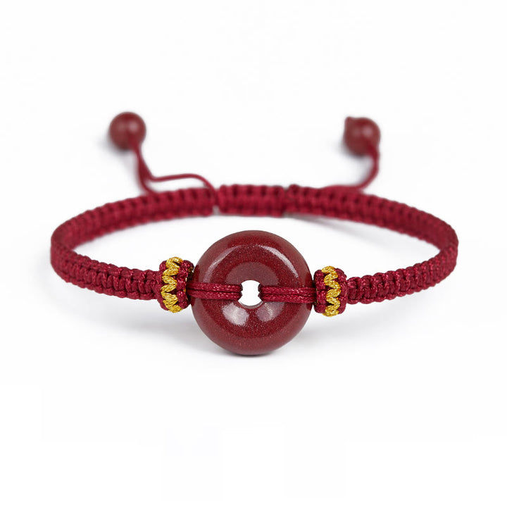 Pulsera trenzada de concentración con hebilla de paz redonda de cinabrio hecha a mano con Buddha Stones