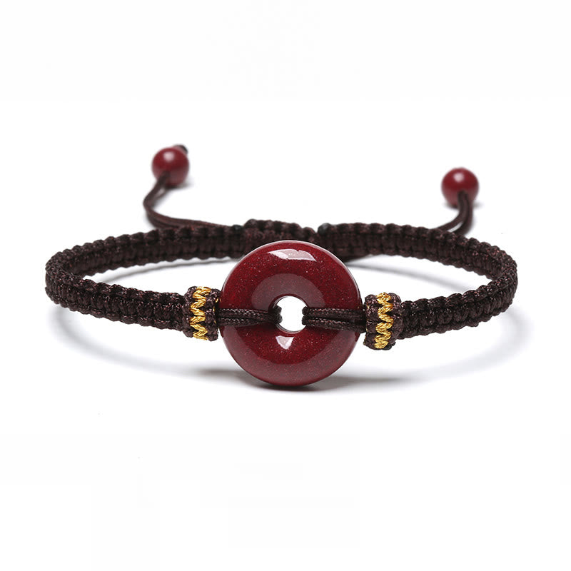 Pulsera trenzada de concentración con hebilla de paz redonda de cinabrio hecha a mano con Buddha Stones