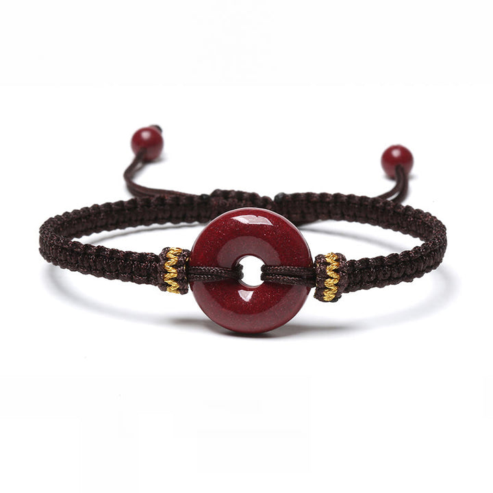 Pulsera trenzada de concentración con hebilla de paz redonda de cinabrio hecha a mano con Buddha Stones