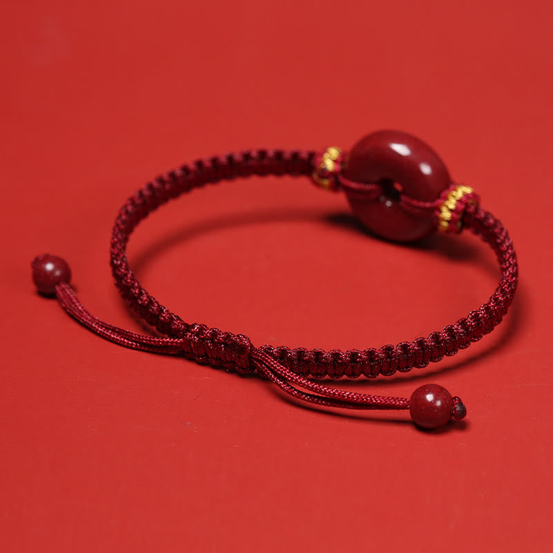 Pulsera trenzada de concentración con hebilla de paz redonda de cinabrio hecha a mano con Buddha Stones