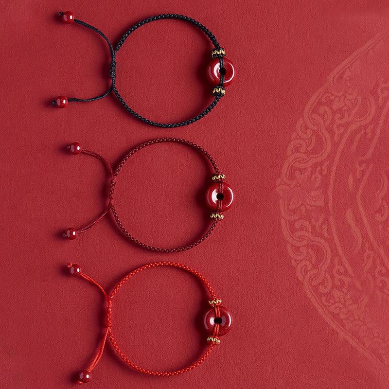 Pulsera trenzada de concentración con hebilla de paz redonda de cinabrio hecha a mano con Buddha Stones