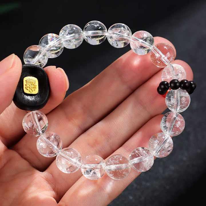 Pulsera curativa de Buddha Stones, cristal blanco y madera de ébano Sak Yant Zashi Lhamo