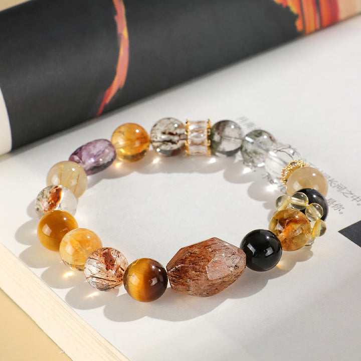 Pulsera de positividad con topacio de cristal, obsidiana, ojo de tigre y Buddha Stones Super Seven