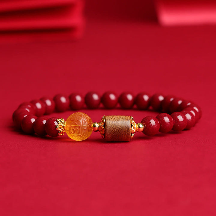 Pulsera de bendición de madera de agar, ámbar, cinabrio y Buddha Stones