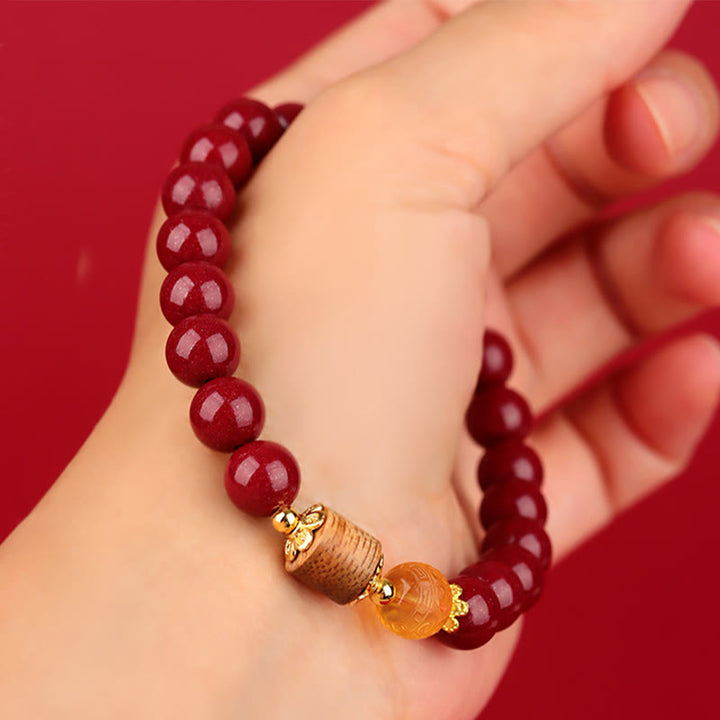 Pulsera de bendición de madera de agar, ámbar, cinabrio y Buddha Stones