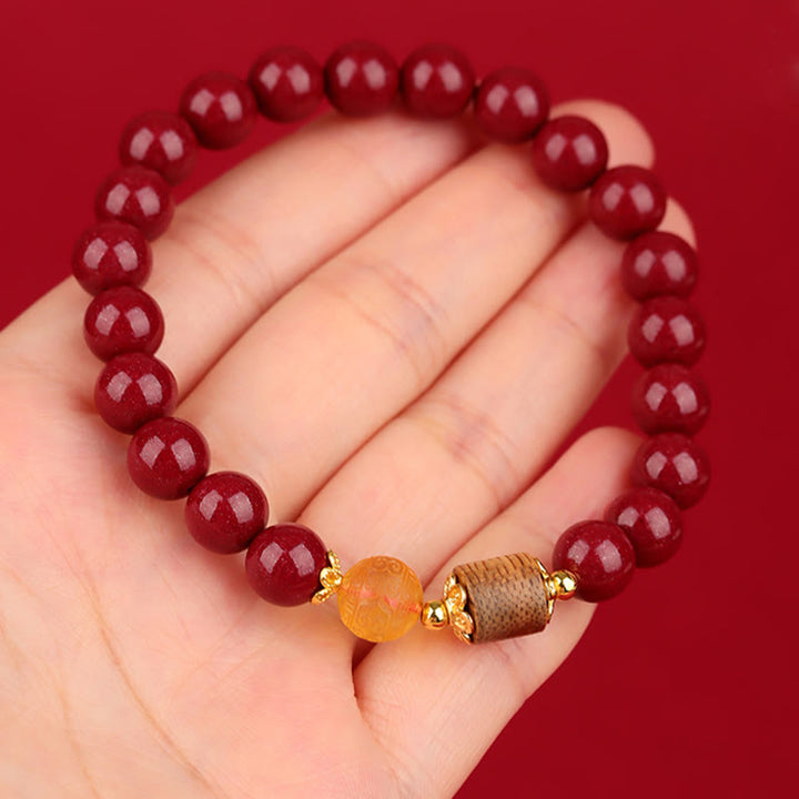 Pulsera de bendición de madera de agar, ámbar, cinabrio y Buddha Stones