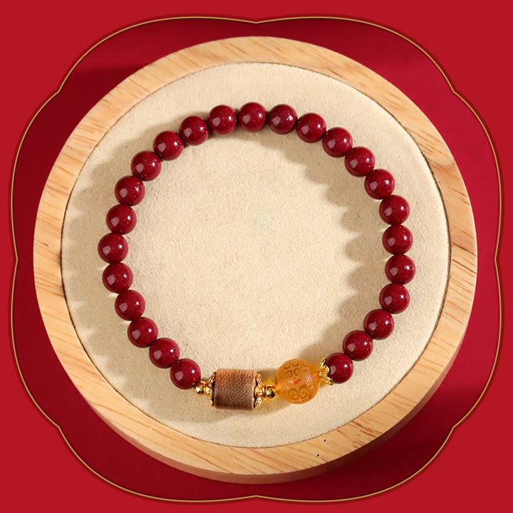 Pulsera de bendición de madera de agar, ámbar, cinabrio y Buddha Stones