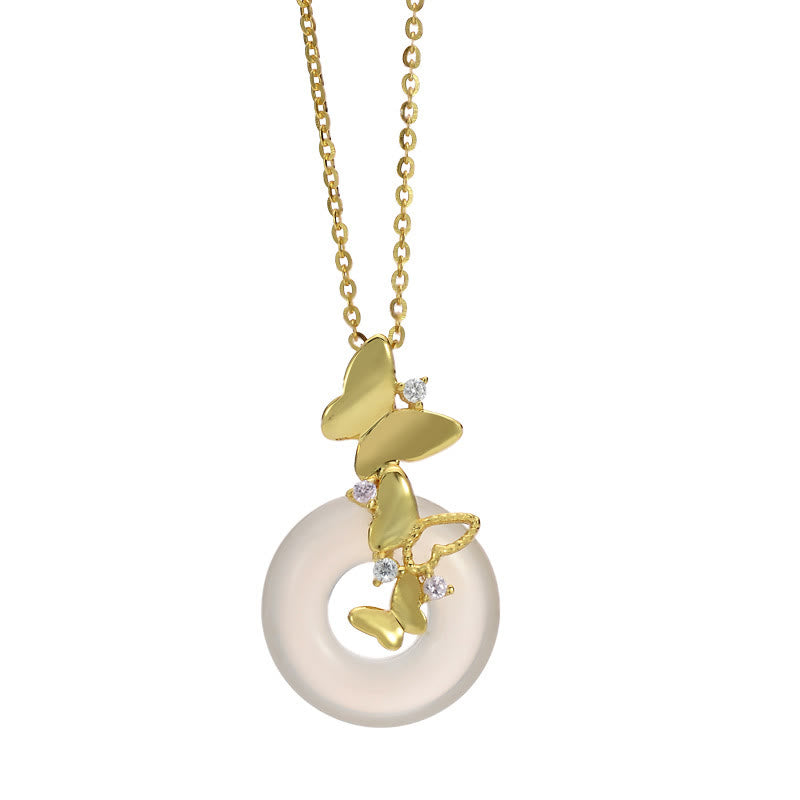 Colgante de plata de Buddha Stones 925 con forma de mariposa y calcedonia, con hebilla de paz y bendición de la suerte