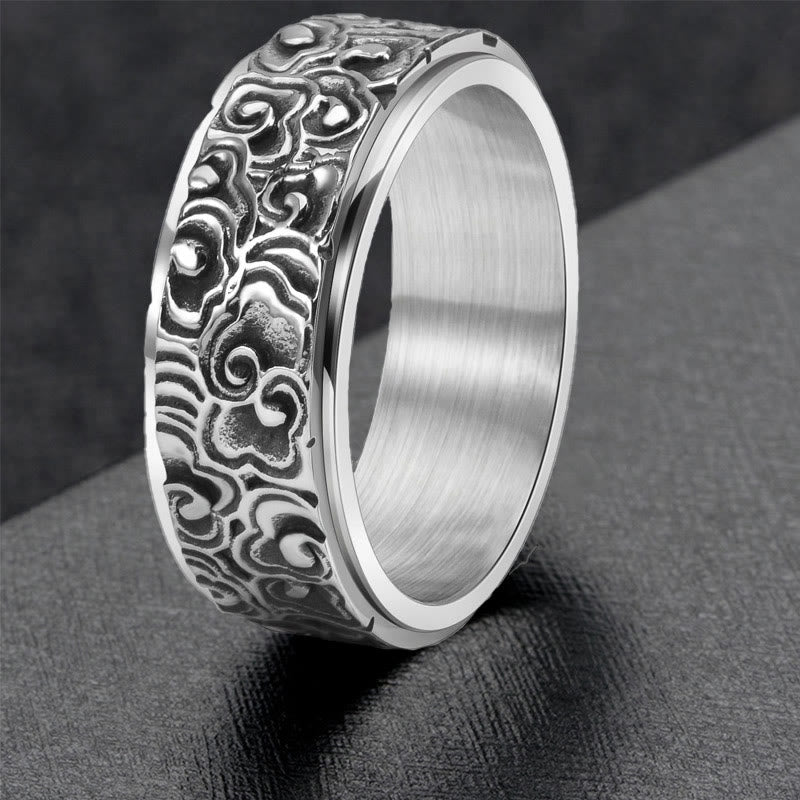 Anillo giratorio de equilibrio de acero de titanio tallado con patrón de nubes auspiciosas y Buddha Stones