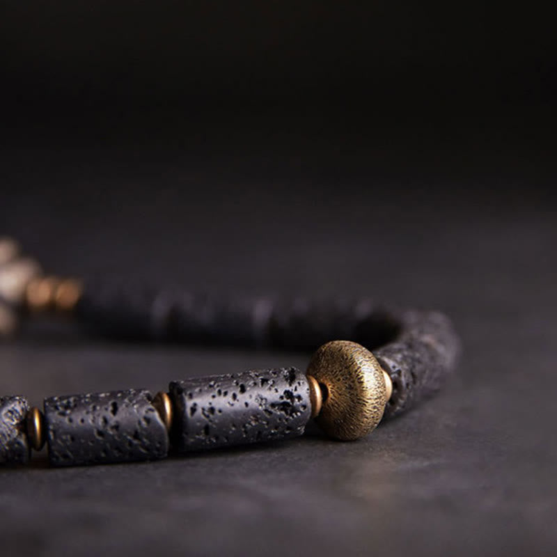 Pulsera de calma con múltiples vueltas de latón y cobre con cuentas Dzi de tres ojos y piedra de lava vintage de Buddha Stones