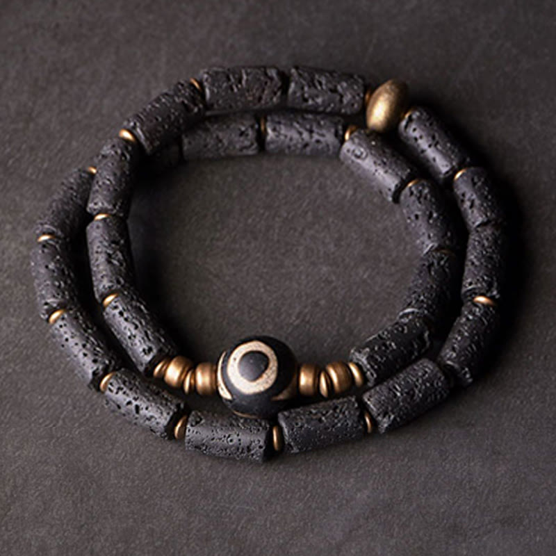 Pulsera de calma con múltiples vueltas de latón y cobre con cuentas Dzi de tres ojos y piedra de lava vintage de Buddha Stones