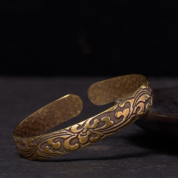 Brazalete de equilibrio de cobre y latón con flores y Buddha Stones para el cuidado personal