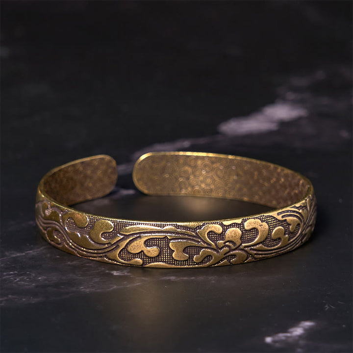 Brazalete de equilibrio de cobre y latón con flores y Buddha Stones para el cuidado personal