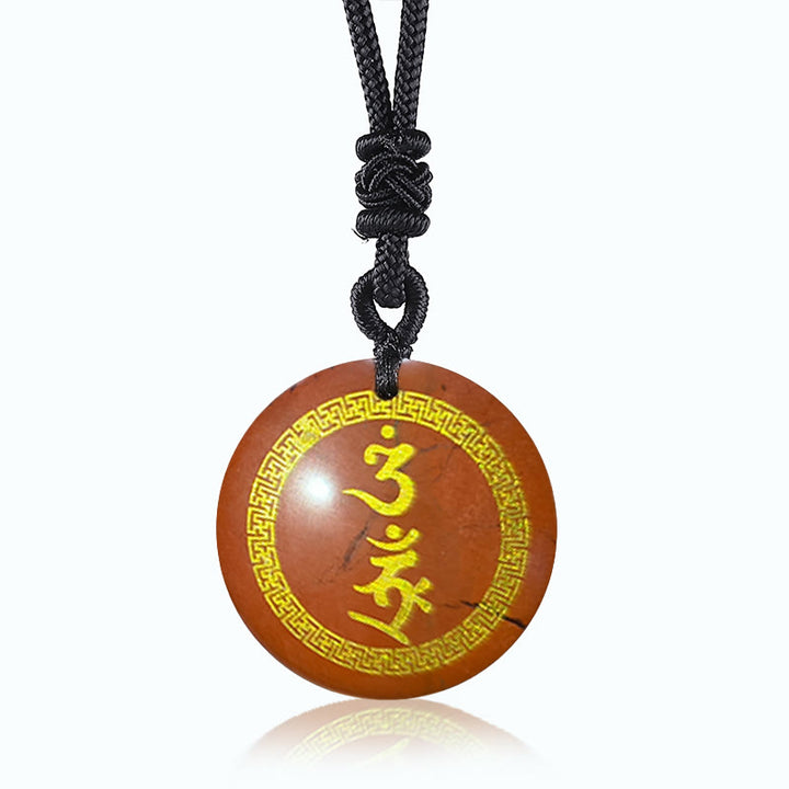Colgante de collar con obsidiana negra con cristales naturales y mantra de protección Vajra con patrón de esvástica que rodea Buddha Stones
