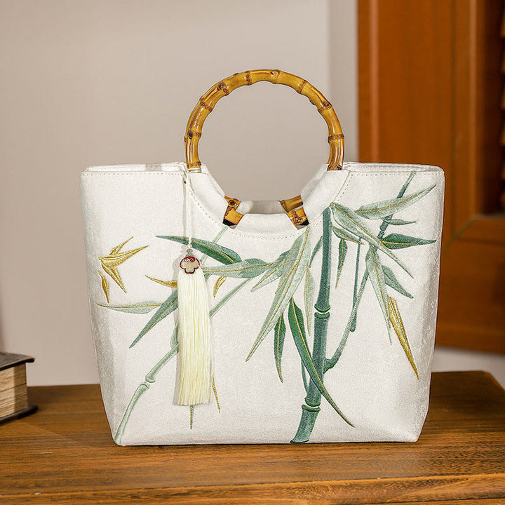 Bolsos de mano con borlas y asas de bambú bordadas con Buddha Stones