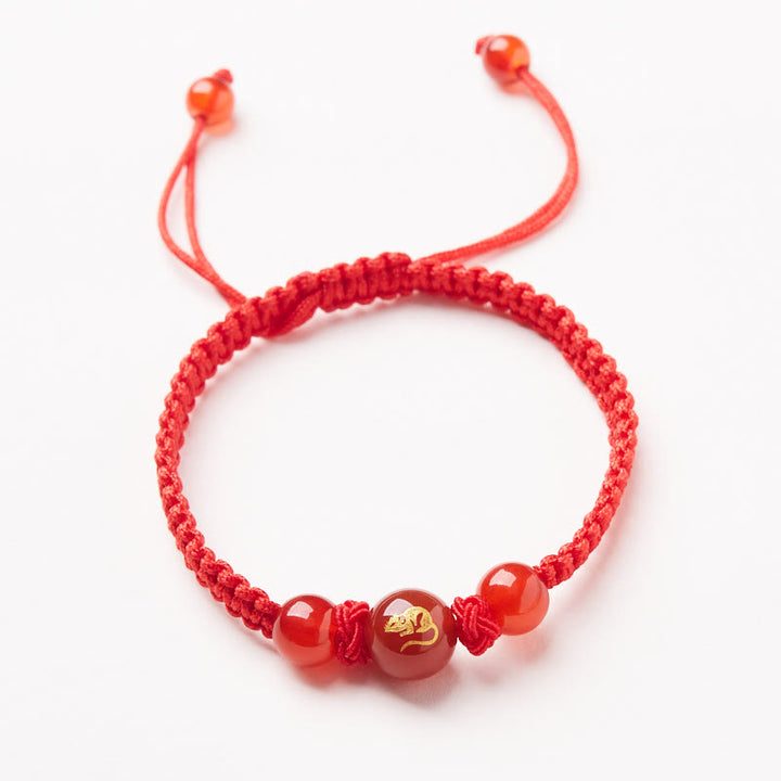 Pulsera trenzada de hilo rojo con ágata roja natural del zodíaco chino y Buddha Stones