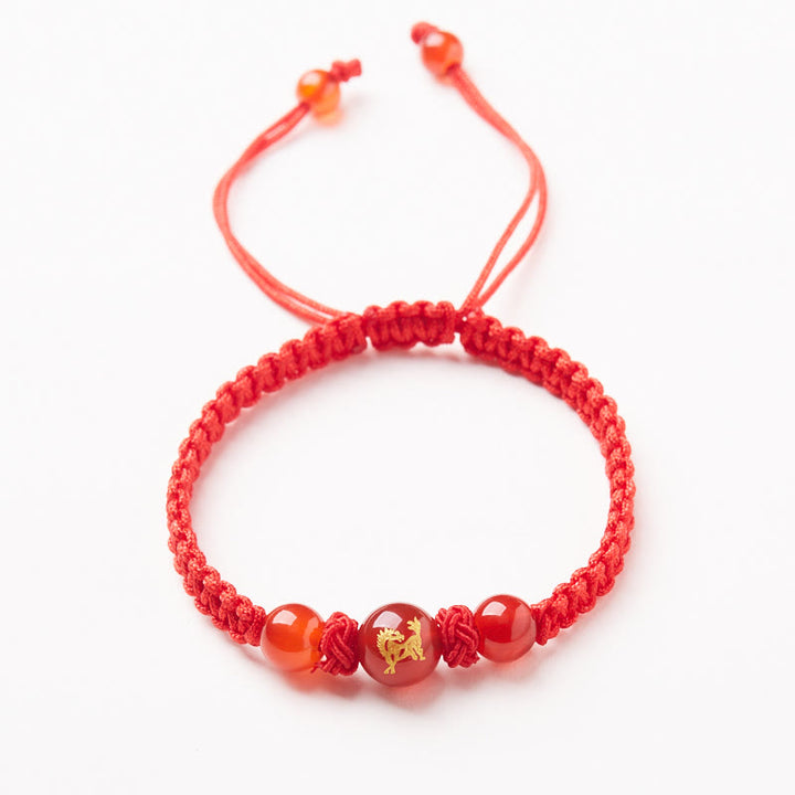 Pulsera trenzada de hilo rojo con ágata roja natural del zodíaco chino y Buddha Stones