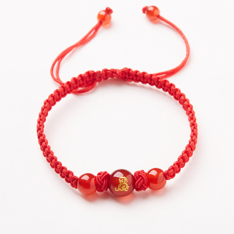 Pulsera trenzada de hilo rojo con ágata roja natural del zodíaco chino y Buddha Stones