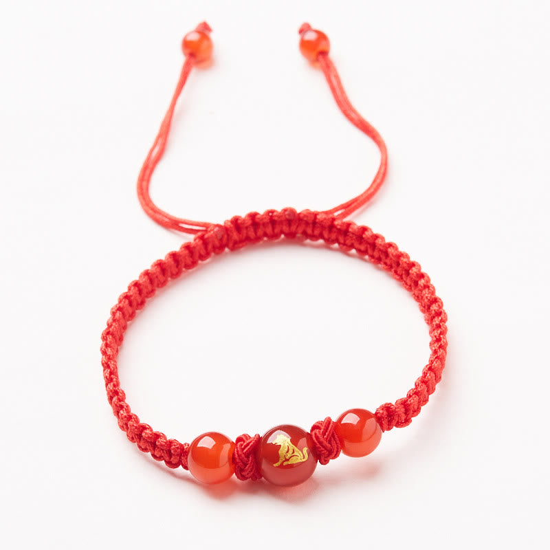 Pulsera trenzada de hilo rojo con ágata roja natural del zodíaco chino y Buddha Stones