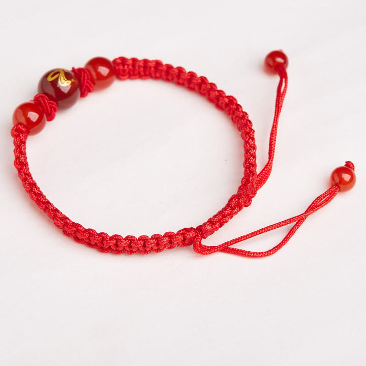 Pulsera trenzada de hilo rojo con ágata roja natural del zodíaco chino y Buddha Stones