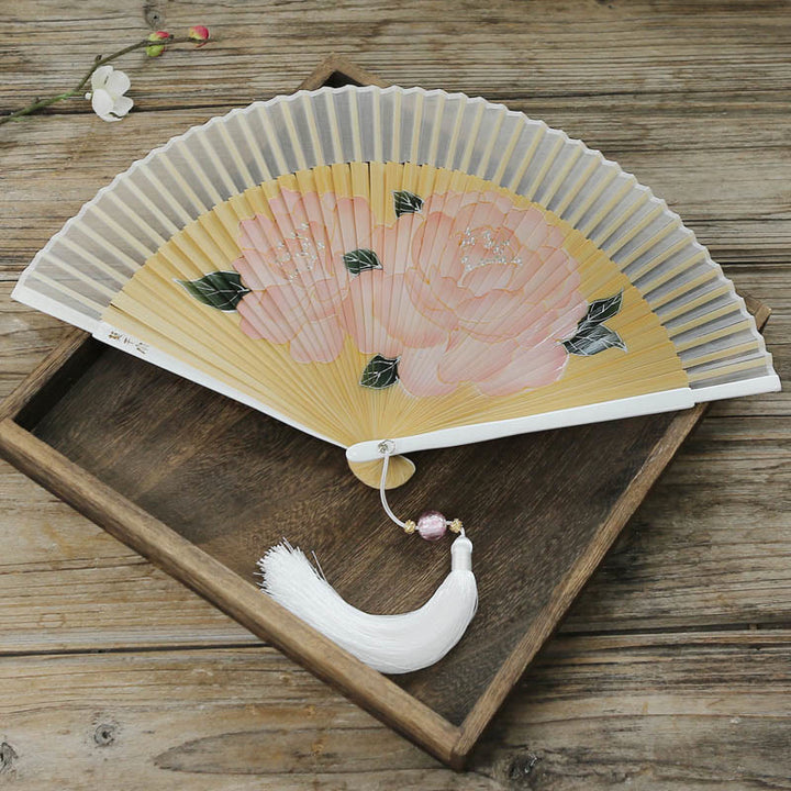Abanico plegable de bambú de mano con flores de peonía y piedras de Buddha Stones