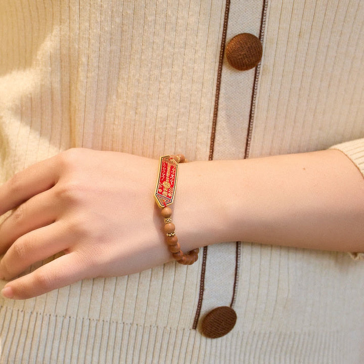 Pulsera de armonía con caracteres chinos Bagua Yin Yang de cobre bañado en oro con cuentas de madera de sándalo y Buddha Stones