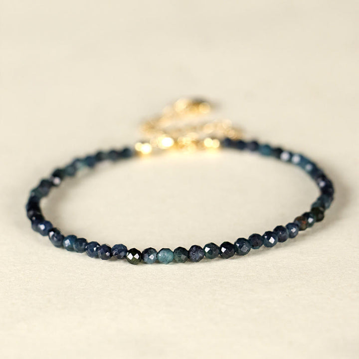 Pulsera de sabiduría con cuentas de cobre, turmalina e indicolita de Buddha Stones