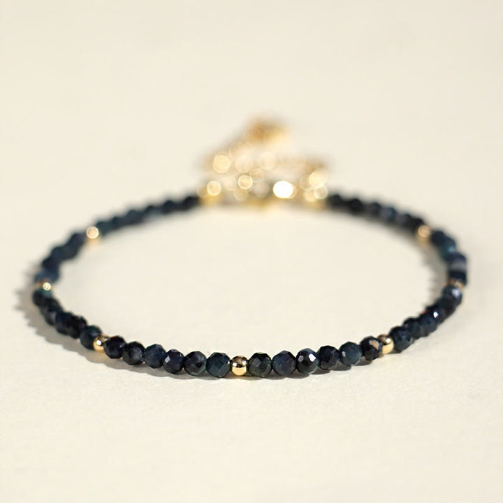 Pulsera de sabiduría con cuentas de cobre, turmalina e indicolita de Buddha Stones